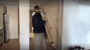Model55 team installing a model apartment assembly design
