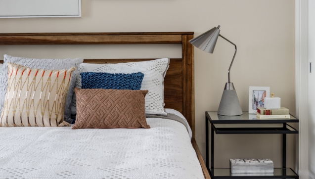 decorative pillows on bed